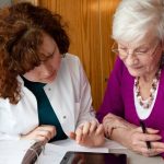 senior woman viewing home care levels